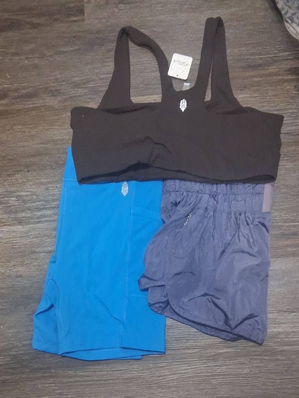 FP Movement by Free People Black Sports Bra with Blue and Purple Shorts